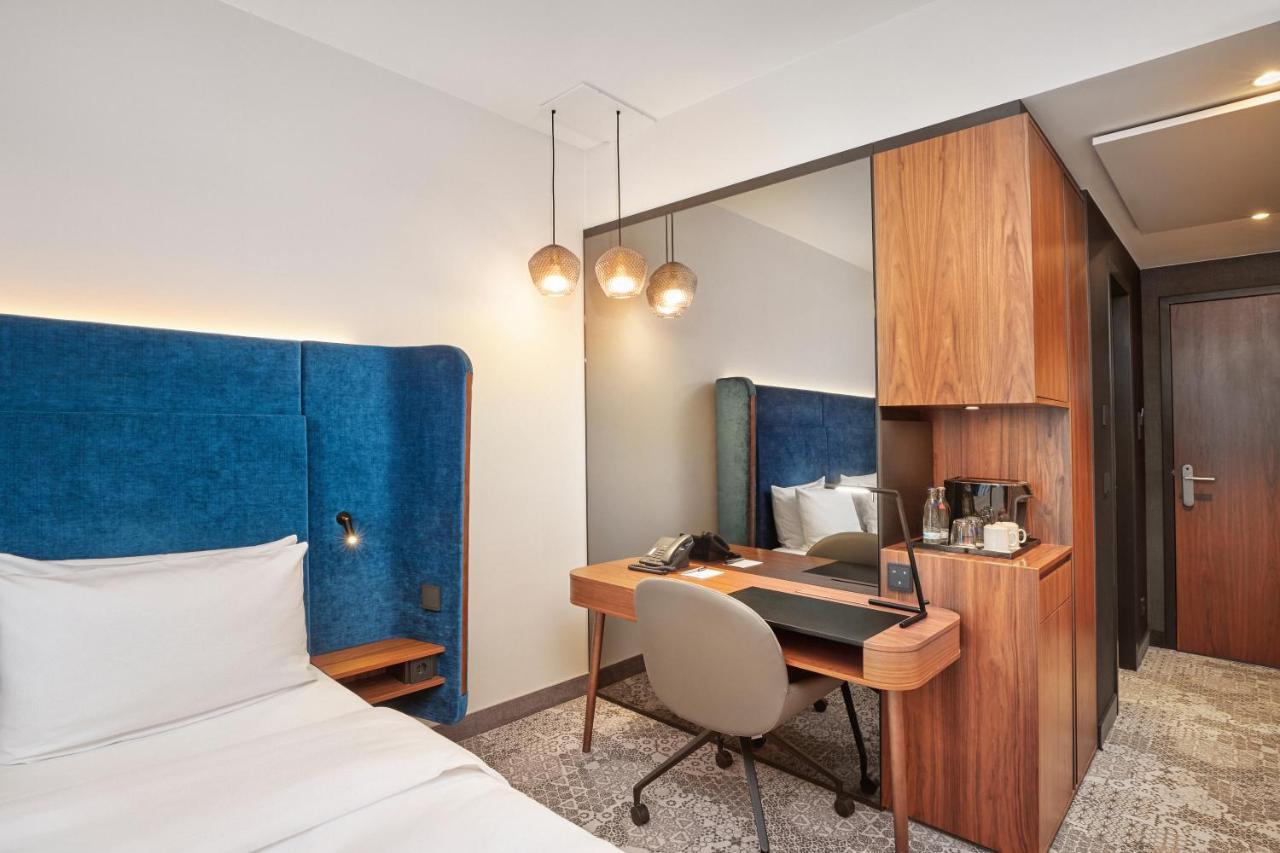 Hyperion Hotel Muenchen Luaran gambar A room at the hotel